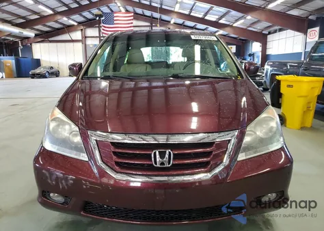 2010 Honda Odyssey Touring z USA, uszkodzony, nr VIN 5FNRL3H90AB063475